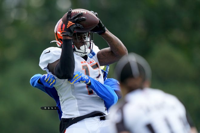 Cincinnati Bengals wide receiver Stanley Morgan (17) complies a catch during a joint practice with the Los Angeles Rams, Wednesday, Aug. 24, 2022, at the Paycor Stadium practice fields in Cincinnati.