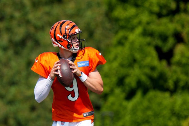 Cincinnati Bengals quarterback Joe Burrow (9) drops back to throw during a joint practice with the Los Angeles Rams, Wednesday, Aug. 24, 2022, at the Paycor Stadium practice fields in Cincinnati.
