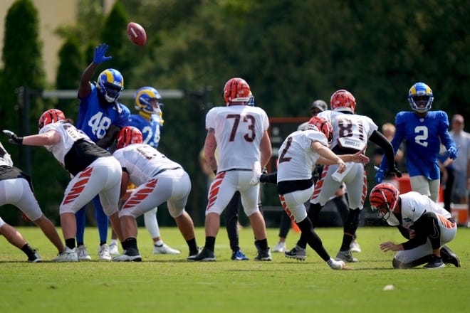 Cincinnati Bengals place kicker Evan McPherson (2) kicks a field goal during a joint practice with the Los Angeles Rams, Wednesday, Aug. 24, 2022, at the Paycor Stadium practice fields in Cincinnati.