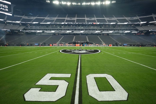 Sep 18, 2022; Paradise, Nevada, USA; The Las Vegas Raiders logo at the 50-yard line at Allegiant Stadium.