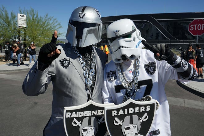 Sep 18, 2022; Paradise, Nevada, USA; Las Vegas Raiders fans in Star Wars stormtrooper costumes tailgate before the Arizona Cardinals game at Allegiant Stadium.