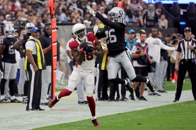 A.J. Green #18 of the Arizona Cardinals catches a pass against Rock Ya-Sin #26 of the Las Vegas Raiders in the third quarter at Allegiant Stadium on Sept. 18, 2022, in Las Vegas, Nevada.