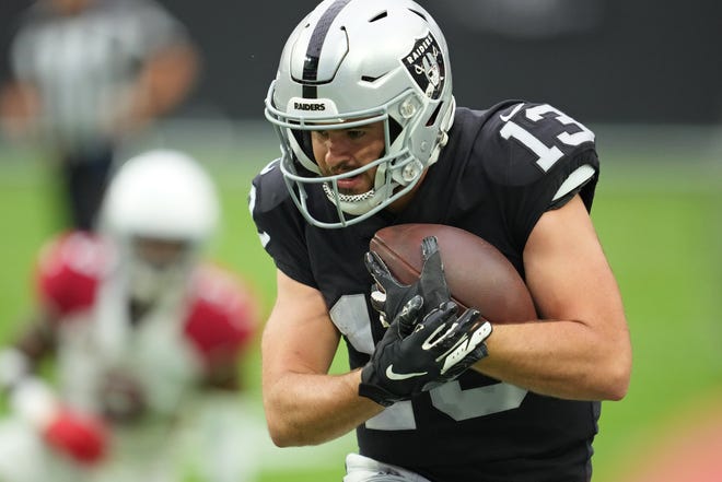 Sep 18, 2022; Paradise, Nevada, USA; Las Vegas Raiders wide receiver Hunter Renfrow (13) makes a catch against the Arizona Cardinals during a game at Allegiant Stadium.