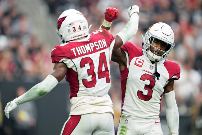 Jalen Thompson #34 and Budda Baker #3 of the Arizona Cardinals react after an incomplete pass in the third quarter against the Las Vegas Raiders at Allegiant Stadium on Sept. 18, 2022, in Las Vegas, Nevada.