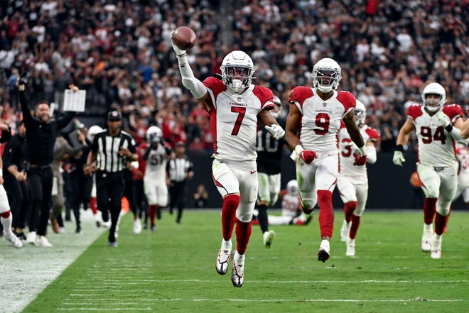 Arizona Cardinals cornerback Byron Murphy Jr. (7) runs back for the game-winning touchdown after a fumble recovery during overtime of an NFL football game Sunday, Sept. 18, 2022, in Las Vegas. Arizona won 29-23.