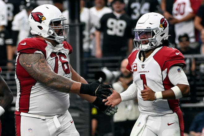 Arizona Cardinals quarterback Kyler Murray (1) celebrates his two-point conversion with tight end Stephen Anderson (89) during the second half of an NFL football game against the Las Vegas Raiders Sunday, Sept. 18, 2022, in Las Vegas.
