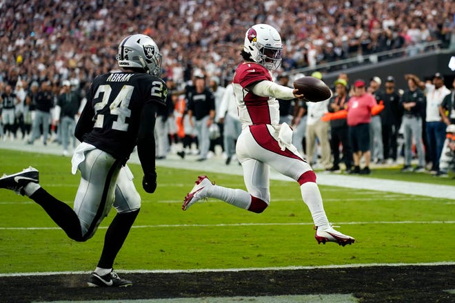 Arizona Cardinals quarterback Kyler Murray runs in for a touchdown as time expires during the fourth quarter of an NFL football game against the Las Vegas Raiders Sunday, Sept. 18, 2022, in Las Vegas.