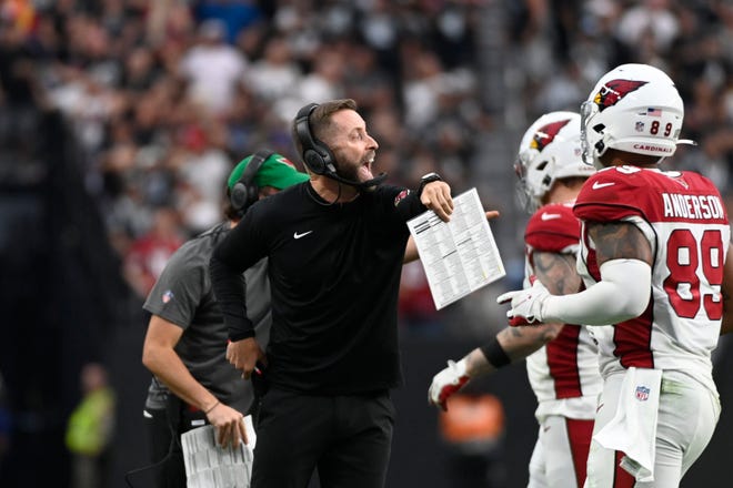 Arizona Cardinals head coach Kliff Kingsbury yells from the sideline during the second half of an NFL football game against the Las Vegas Raiders Sunday, Sept. 18, 2022, in Las Vegas.