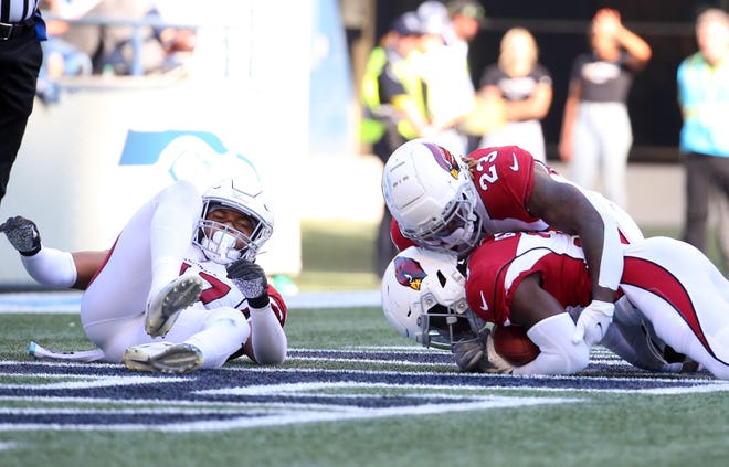 Chris Banjo #31 of the Arizona Cardinals recovers a fumble for a touchdown against the Seattle Seahawks during the third quarter at Lumen Field on October 16, 2022, in Seattle, Washington.