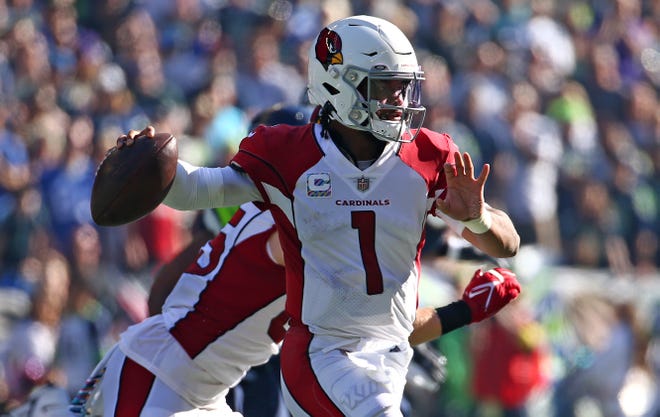 Kyler Murray #1 of the Arizona Cardinals passes against the Seattle Seahawks during the first half at Lumen Field on October 16, 2022, in Seattle, Washington.