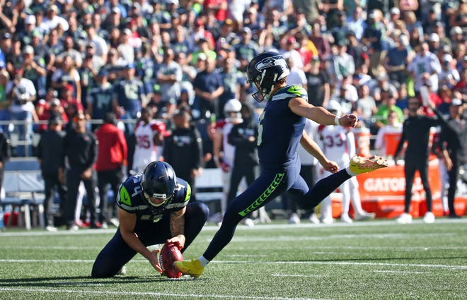 Jason Myers #5 of the Seattle Seahawks kicks a field goal against the Arizona Cardinals during the first half at Lumen Field on October 16, 2022, in Seattle, Washington.