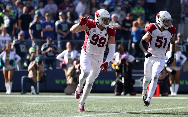 J.J. Watt #99 of the Arizona Cardinals celebrates against the Seattle Seahawks during the first half at Lumen Field on October 16, 2022, in Seattle, Washington.