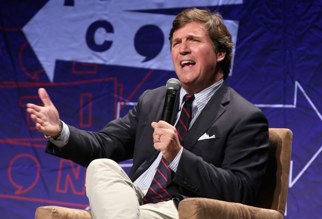 Tucker Carlson speaks onstage during Politicon 2018 at Los Angeles Convention Center on Oct. 21, 2018.